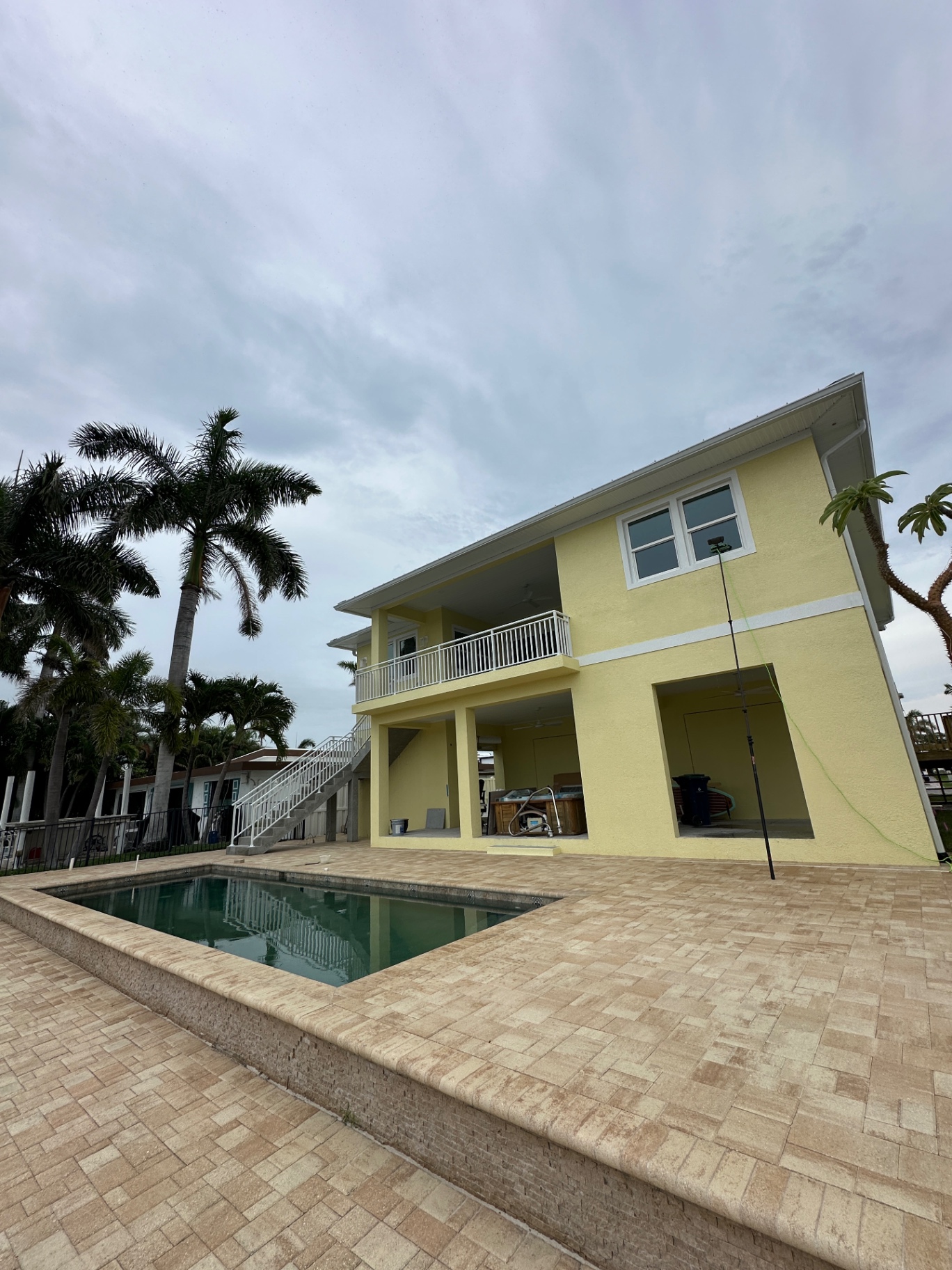 Two-story exterior — water-fed pole cleaning