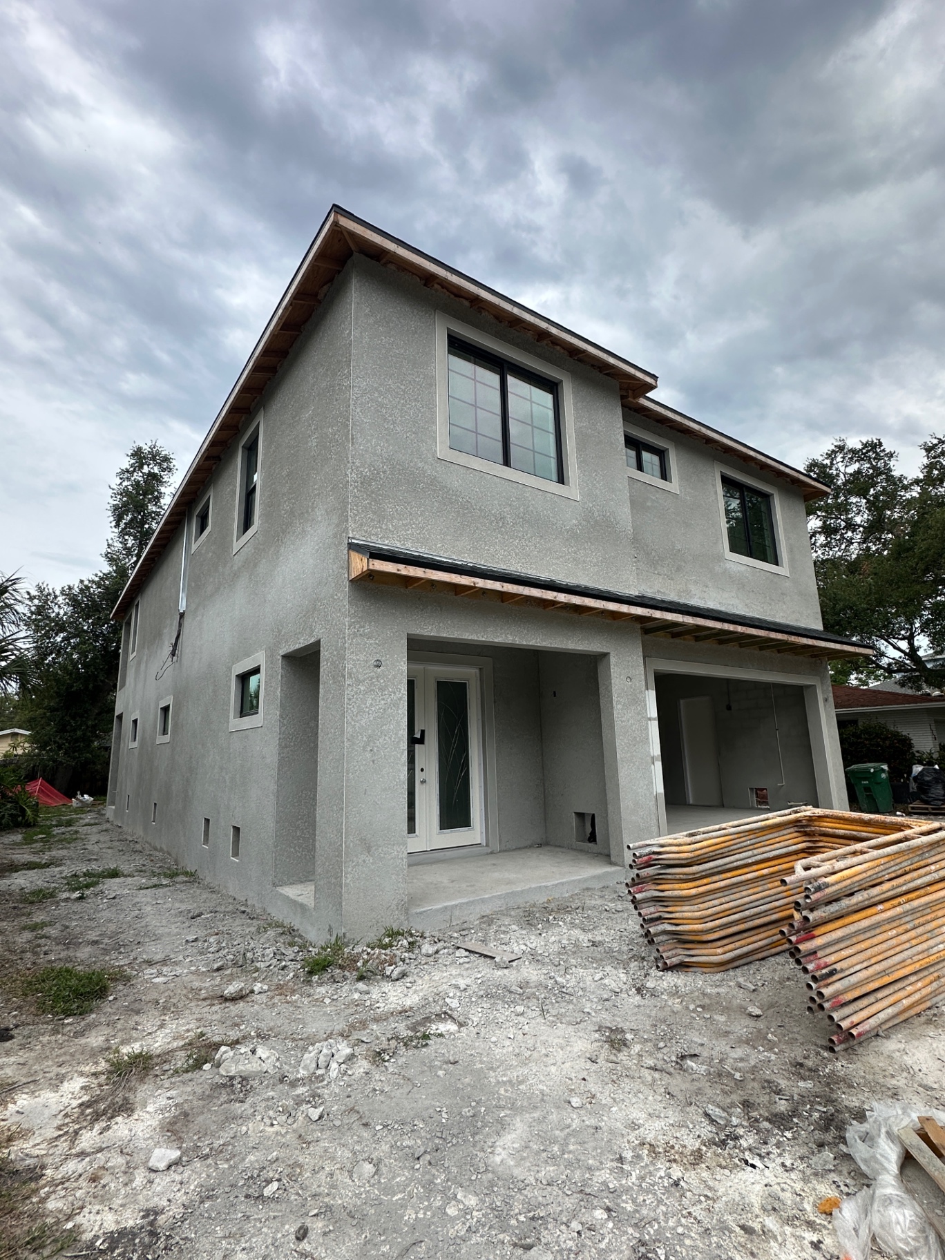 Post-construction stucco home — ready for final detail