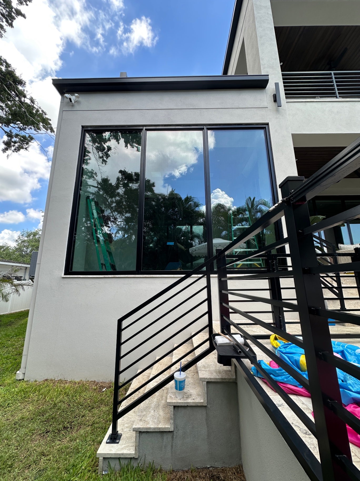 Floor-to-ceiling glass — streak-free finish