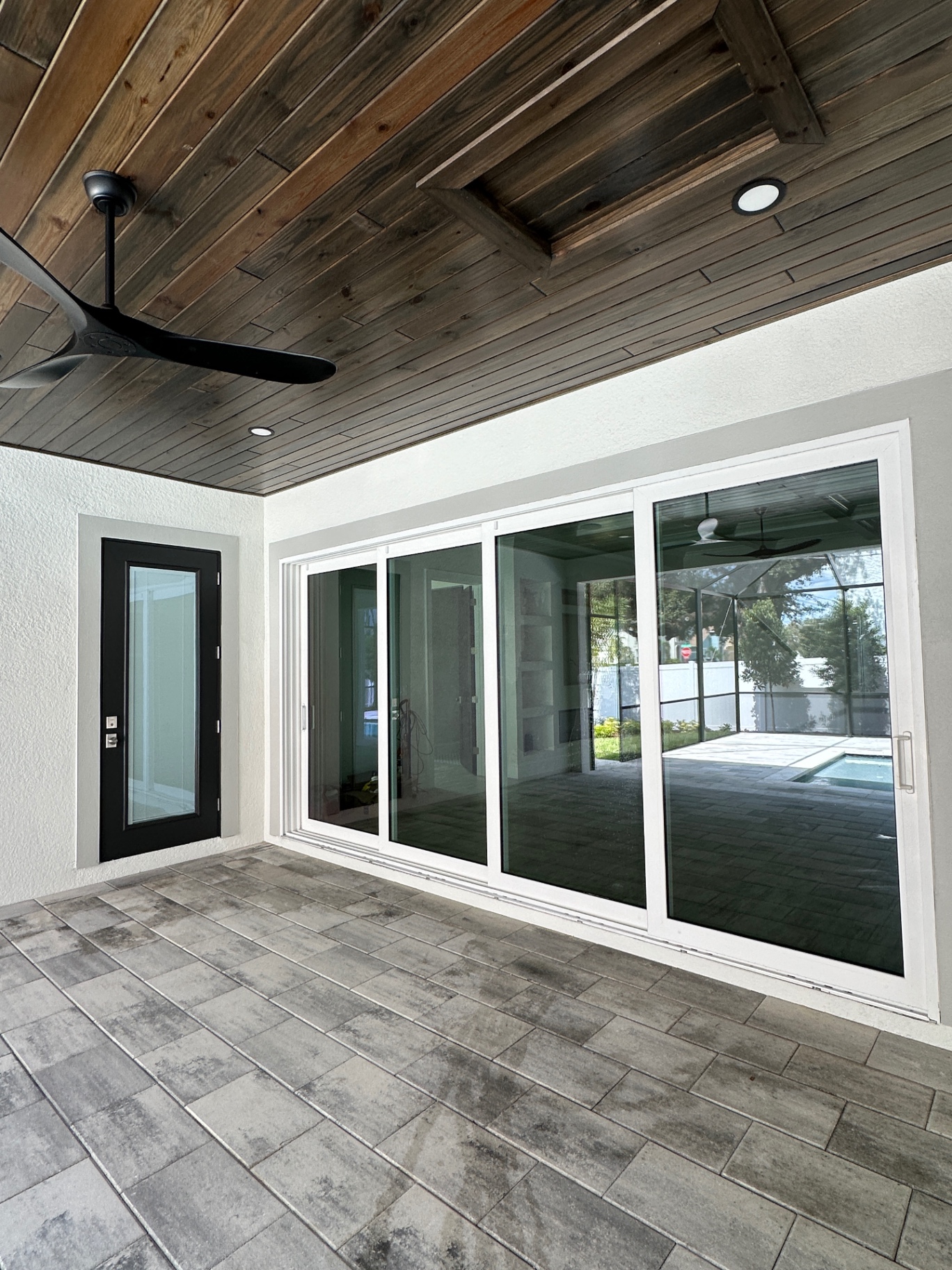 Covered patio sliders — floor-to-ceiling clarity