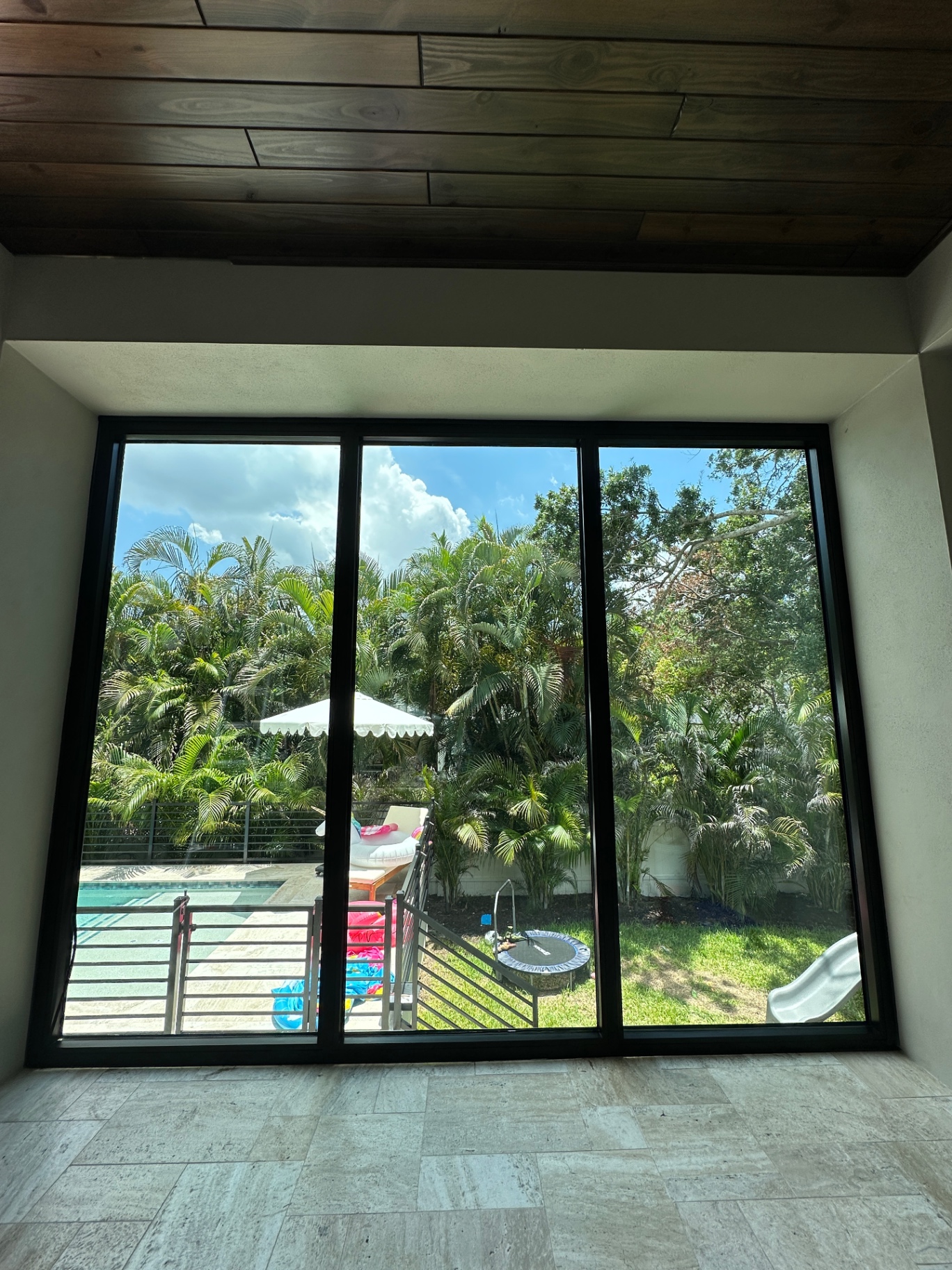 Poolside view through spotless glass
