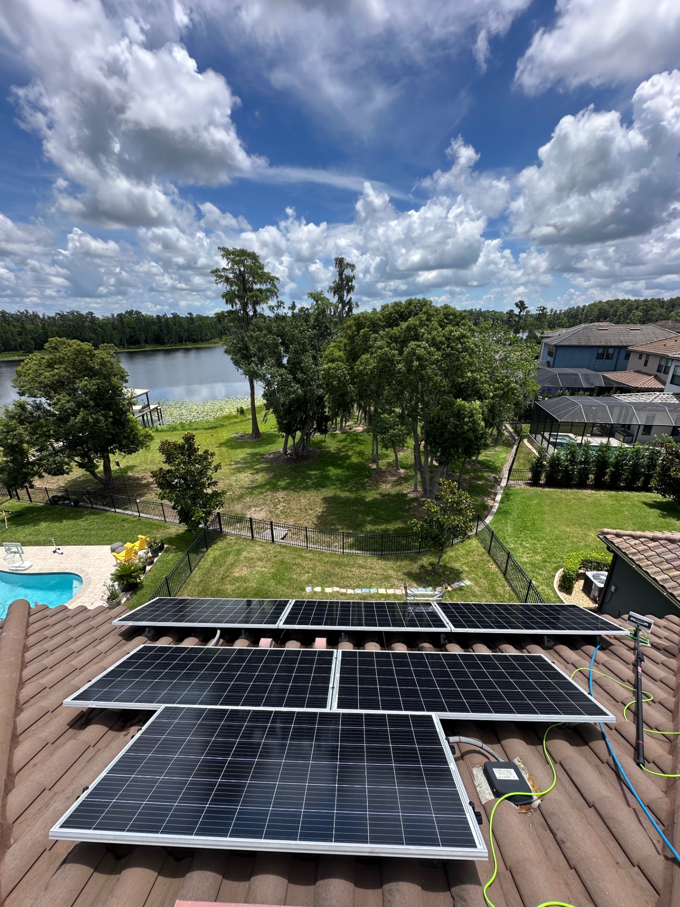 Rooftop solar array — lakefront home